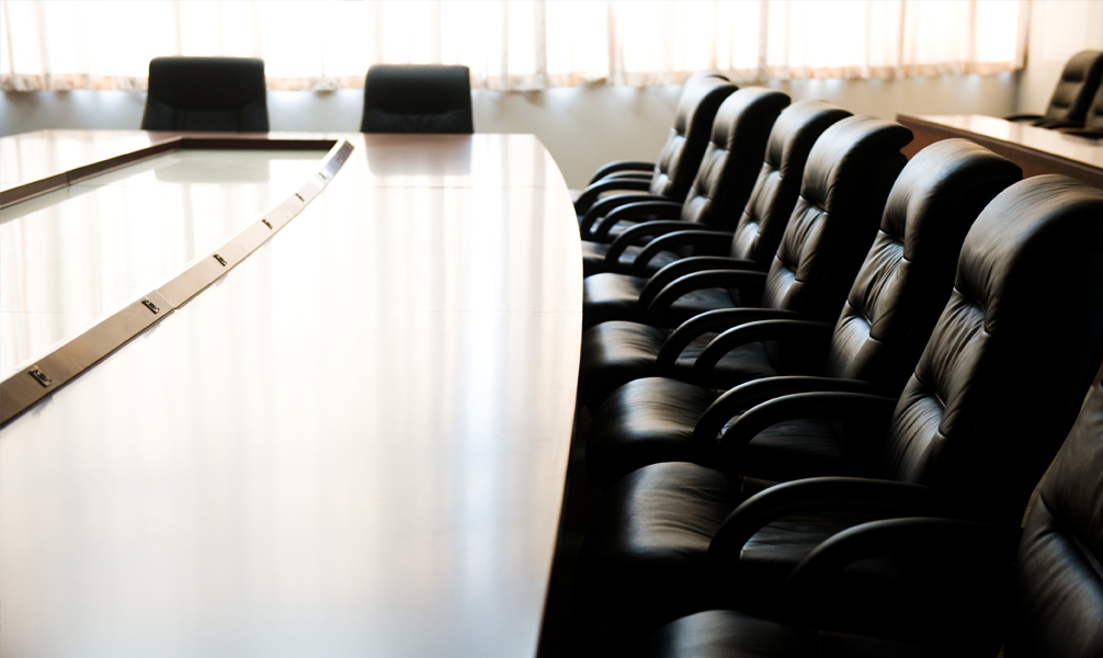 Photo of empty board room. 