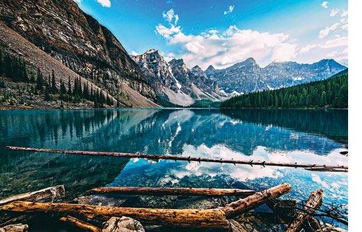 Original photograph of Moraine Lake located in the Valley of Ten Peaks in Banff National Park, Alberta, Canada by Canadian photographer and filmmaker Peter McKinnon.