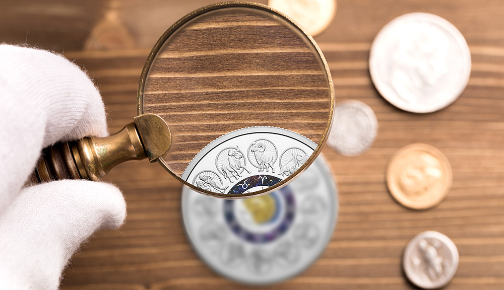image A magnifying glass. Coins are small and can be extremely detailed: a magnifying glass with at least 7x magnification will reveal all the intricacies of your favourite designs.